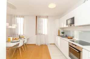 Apartment (A1) | Private kitchen | Fridge, oven, stovetop, dishwasher - (Split)