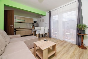 Apartment (A2) | Wohnzimmer | Flachbildfernseher