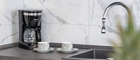 Appartement (A1) | Cuisine privée | Réfrigérateur, four à micro-ondes, un four, surface de cuisson