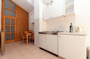 Apartment (A6) | Private kitchen | Fridge, stovetop, espresso maker, electric kettle - Apartments Near Beach (Dugi Rat)