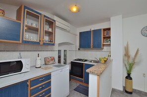 Apartment (A2) | Private kitchen | Fridge, microwave, stovetop, espresso maker - Apartments Lory (Labin)