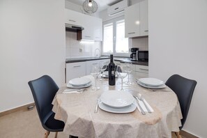 Apartment (A1) | Private kitchen | Fridge, microwave, oven, stovetop - Apartment Karmen (Dobrinj)