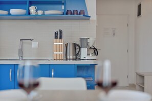Appartement (A1) | Cuisine privée | Réfrigérateur, plaque de cuisson, machine à expresso
