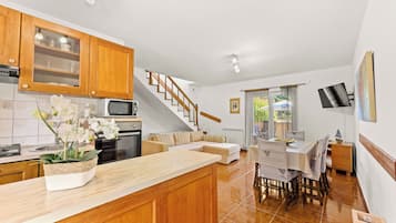 Apartment (A1) | Private kitchen | Fridge, microwave, stovetop, dishwasher