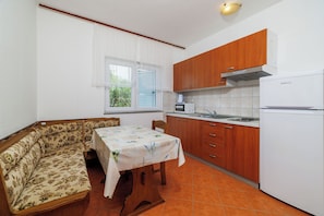 Apartment (A2) | Private kitchen | Fridge, microwave, stovetop, espresso maker - Apartments Anica J (Lopar)