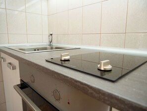 Apartment (A2) | Private kitchen | Fridge, oven, stovetop, electric kettle - Apartments Vlade (Primosten)