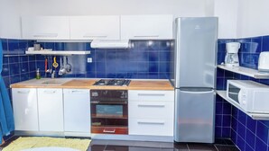 Apartment (A2) | Private kitchen | Espresso maker, fridge, microwave, oven - Apartments Tanjy (Crikvenica)
