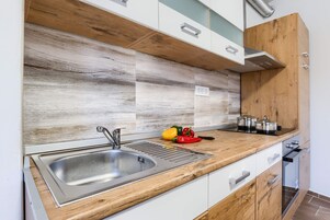 Apartment (A1) | Private kitchen | Fridge, stovetop, espresso maker, electric kettle