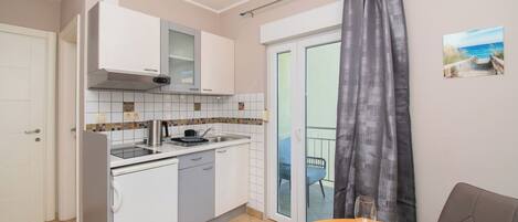 Apartment (A1) | Private kitchen | Fridge, microwave, stovetop, espresso maker