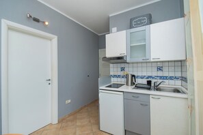 Apartment (A4) | Private kitchen | Fridge, microwave, stovetop, espresso maker - Apartments Ivica (Vodice)