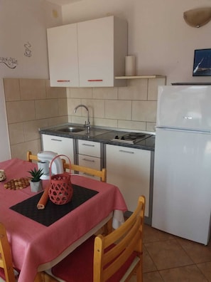 Apartment (A2) | Private kitchen | Fridge, microwave, stovetop, espresso maker - Apartments and Room Wish (Sibenik)