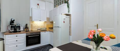 Apartment (A1) | Private kitchen | Espresso maker, fridge, microwave, oven