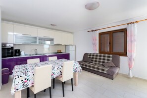 Apartment (A2) | Private kitchen | Fridge, oven, stovetop, espresso maker - Apartments Mario (Lopar)