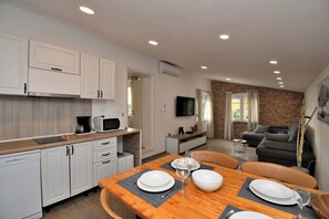 Apartment (A2) | Private kitchen | Fridge, microwave, stovetop, dishwasher - Apartments Plomin (Krsan)