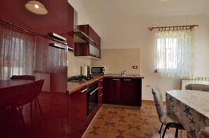 Apartment (A1) | Private kitchen | Fridge, microwave, oven, stovetop - Apartments Emil (Umag)