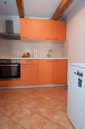 Apartment (A2) | Private kitchen | Fridge, oven, stovetop, electric kettle - Apartments Lovran (Lovran)