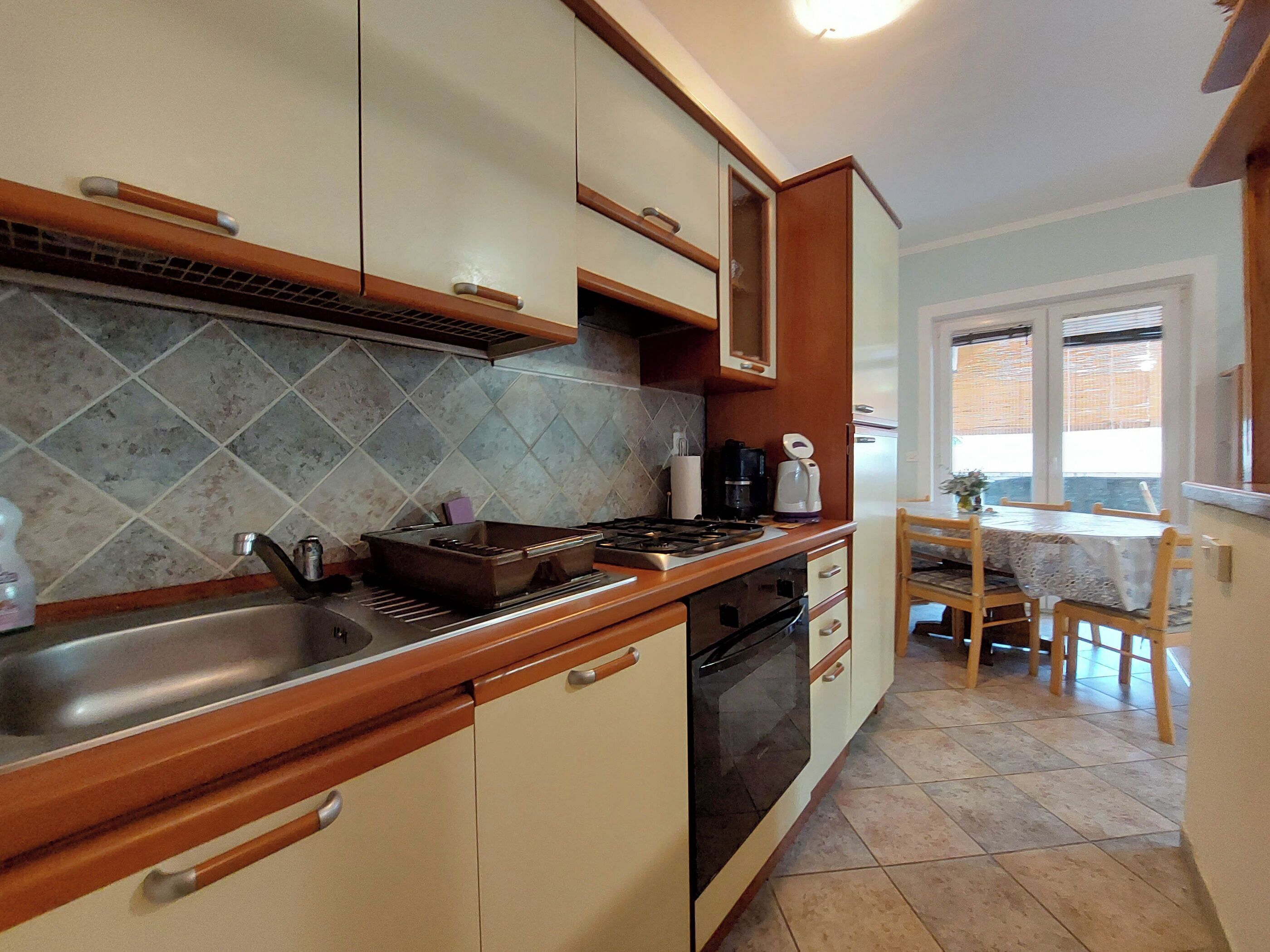 Apartment (A1) | Private kitchen | Fridge, microwave, oven, stovetop