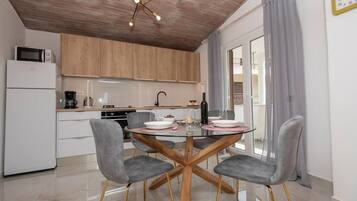 Apartment (A1) | Private kitchen | Fridge, microwave, oven, stovetop