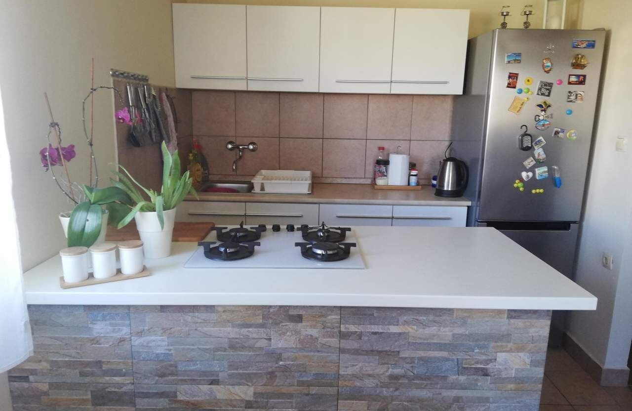 Appartement (A1) | Cuisine privée | Réfrigérateur, four à micro-ondes, un four, surface de cuisson