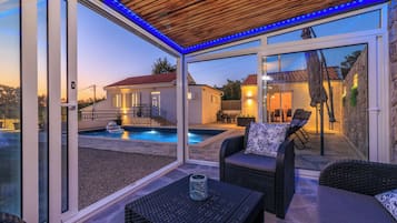 Outdoor pool, pool umbrellas, pool loungers