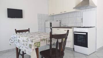 Estúdio (A2) | Cozinha privada | Geladeira, fogão, cooktop, chaleira elétrica