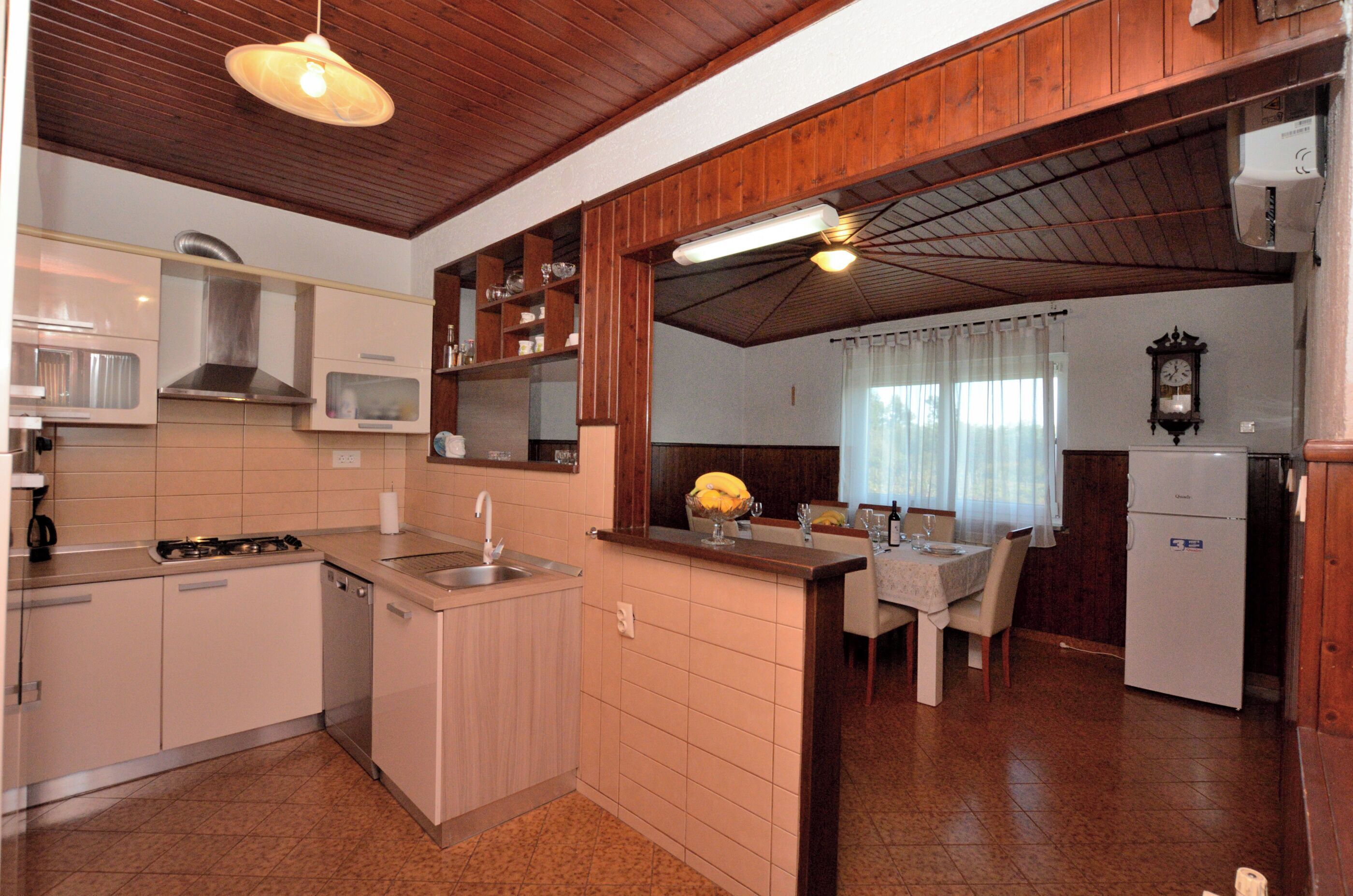 Villa | Private kitchen | Fridge, microwave, oven, stovetop