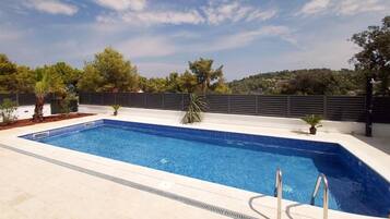 Outdoor pool, sun loungers