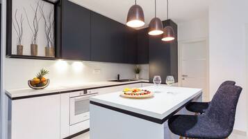 Villa | Private kitchen | Microwave, oven, stovetop, dishwasher