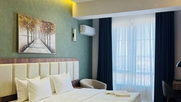 Comfort Double or Twin Room, Balcony, City View | In-room safe, laptop workspace, blackout drapes, iron/ironing board