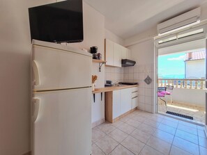 Apartment (A1) | Private kitchen | Fridge, stovetop, espresso maker, electric kettle - Apartment Drena (Novi Vinodolski)