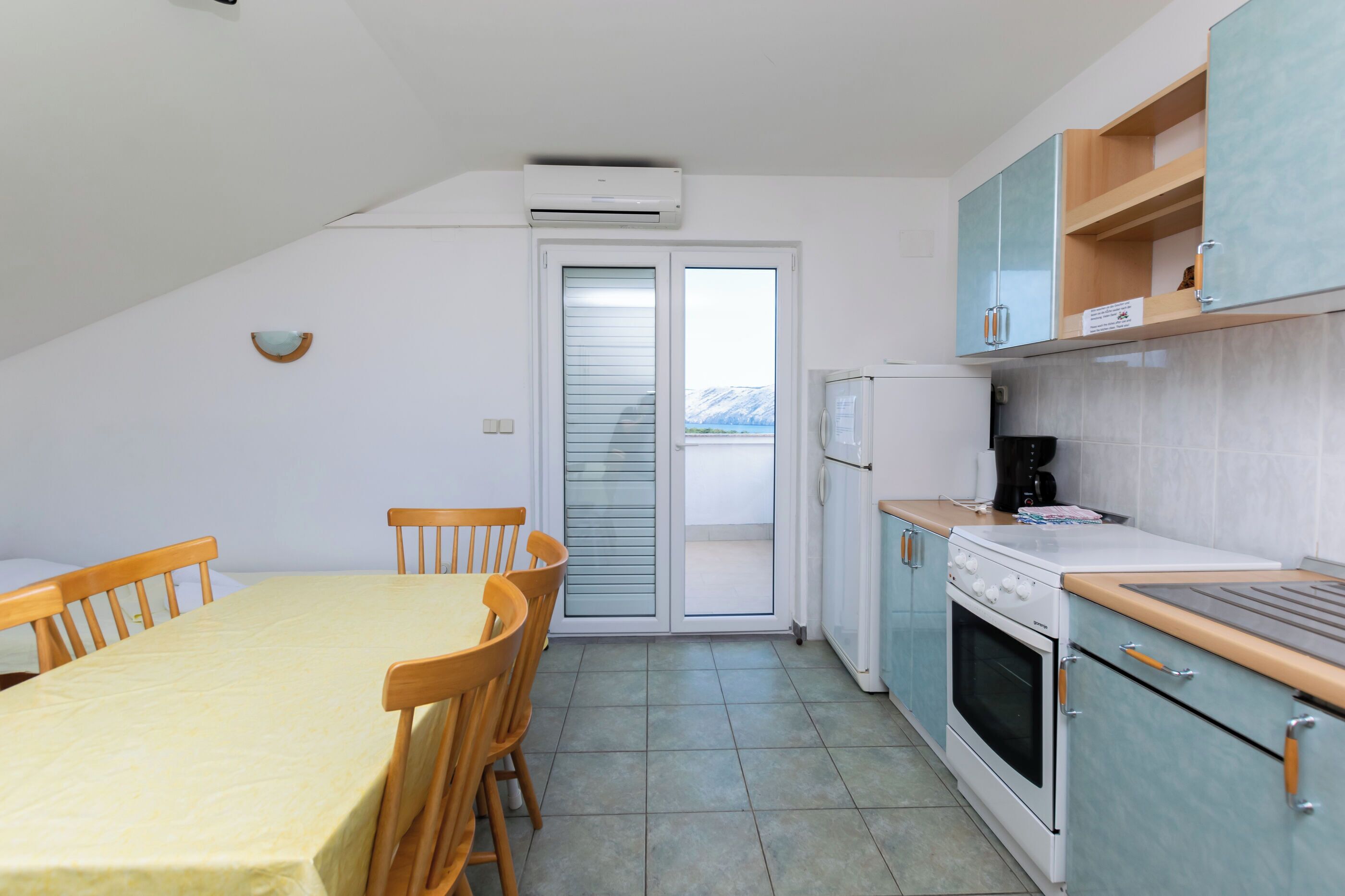 Apartamento (A3) | Cozinha privada | Geladeira, fogão, cooktop, máquina de café expresso