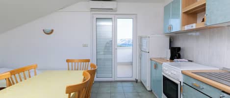Apartment (A3) | Private kitchen | Fridge, oven, stovetop, espresso maker