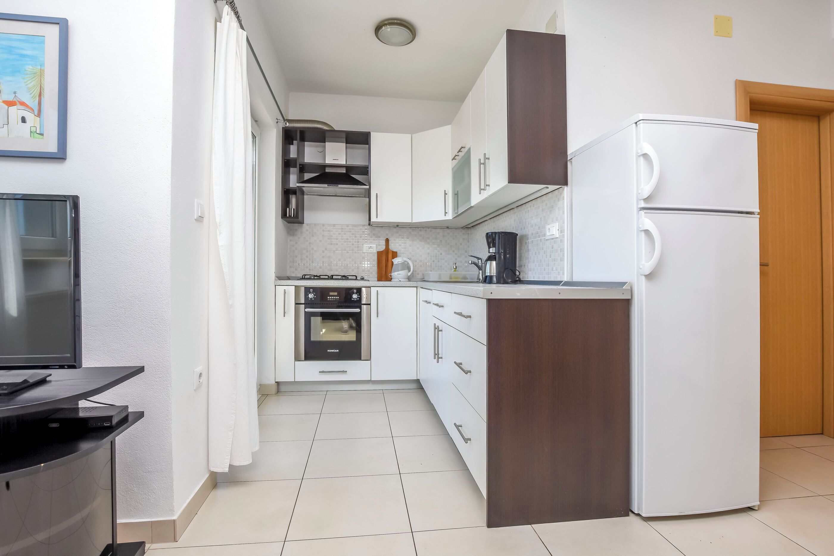 Apartment (A4) | Private kitchen | Fridge, oven, stovetop, espresso maker