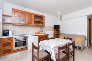 Apartment (A2) | Private kitchen | Fridge, stovetop, espresso maker, electric kettle - Apartments Ljubica J (Lopar)