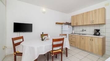 Apartment (A4) | Private kitchen | Fridge, microwave, stovetop, espresso maker