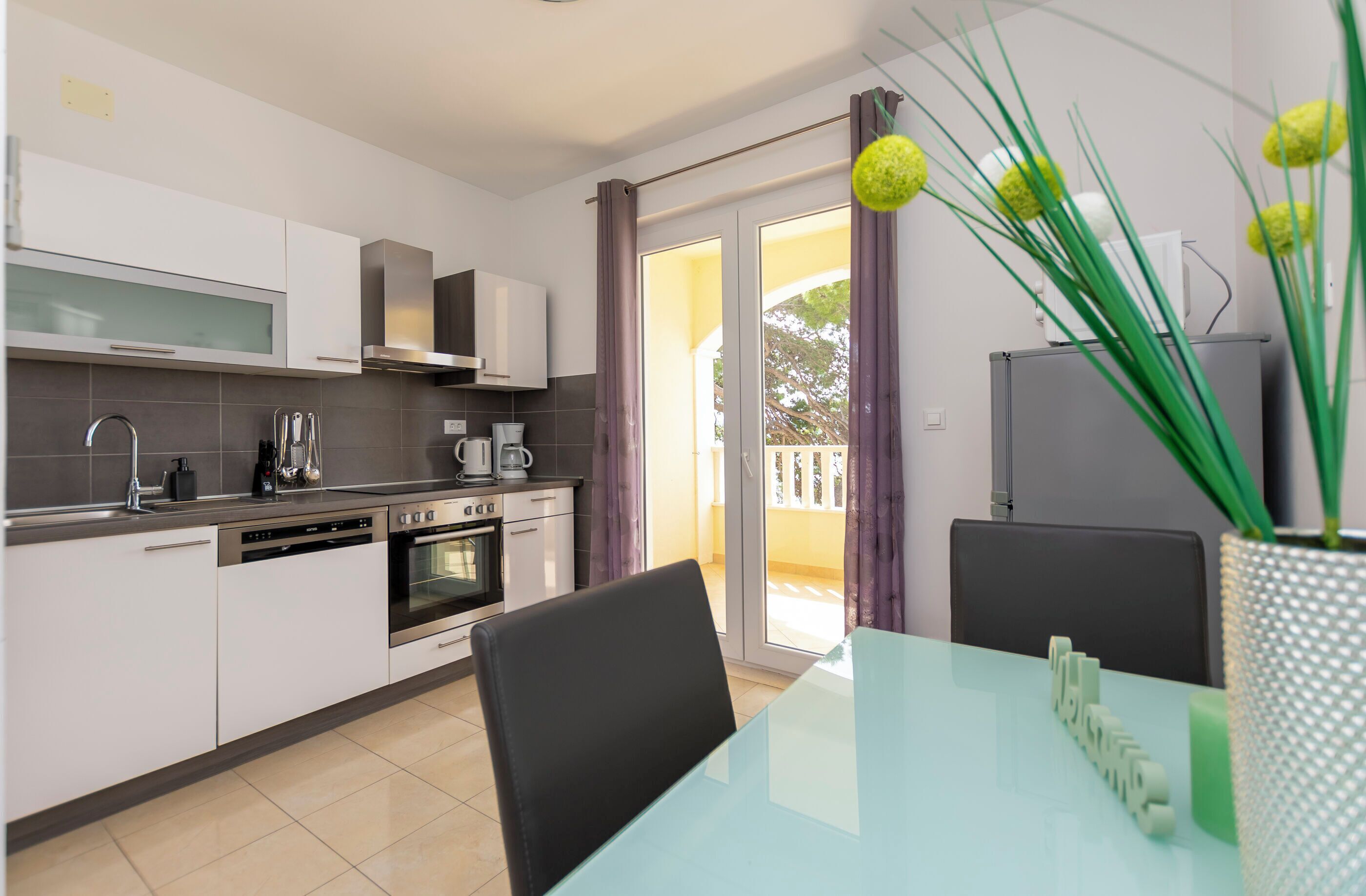 Apartment (A2) | Private kitchen | Fridge, microwave, oven, stovetop