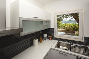 Vila | Cozinha privada | Geladeira, micro-ondas, fogão, cooktop