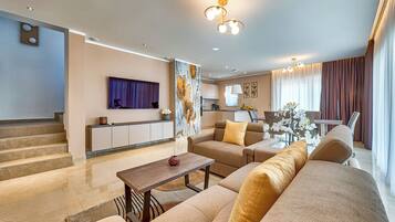 Villa | Living room | Fireplace, DVD player