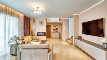 Villa | Living room | Fireplace, DVD player