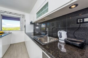 Villa | Private kitchen | Fridge, microwave, oven, stovetop - House Villa Beleca (Hvar)
