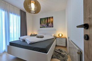 Apartemen (A1) | Setrika/meja setrika, tempat tidur bayi gratis, dan Wi-Fi gratis