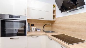 Apartment (A7) | Private kitchen | Fridge, oven, stovetop, dishwasher