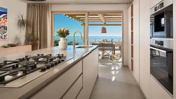Villa | Private kitchen | Fridge, oven, stovetop, dishwasher