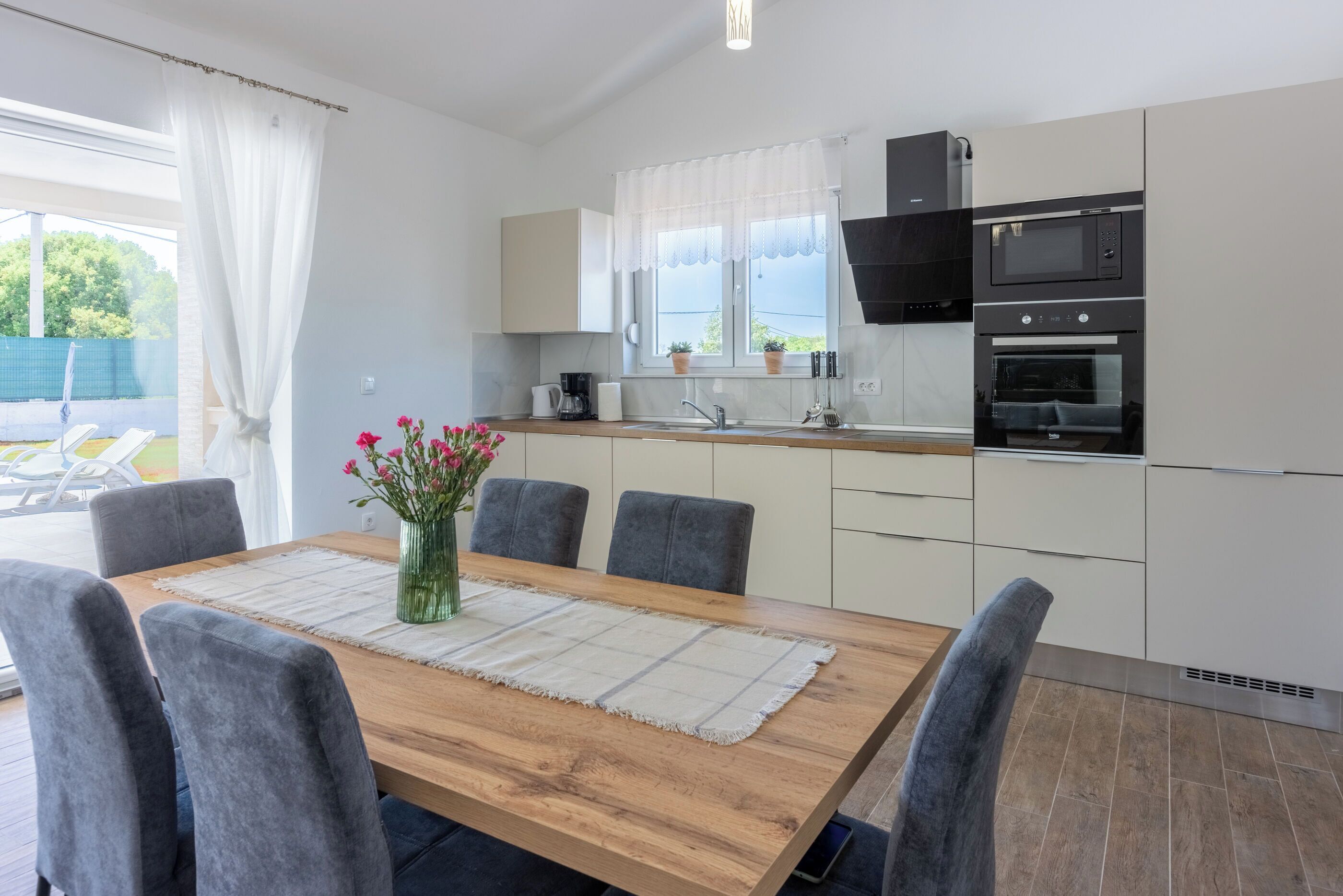 Villa | Private kitchen | Fridge, microwave, oven, stovetop