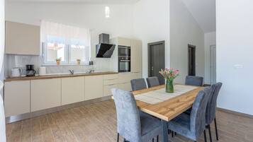 Villa | Private kitchen | Fridge, microwave, oven, stovetop