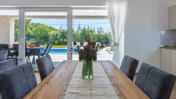 Villa | Private kitchen | Fridge, microwave, oven, stovetop