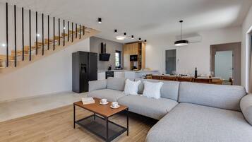 Villa | Private kitchen | Fridge, microwave, oven, stovetop