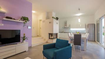 Villa | Living room | Fireplace