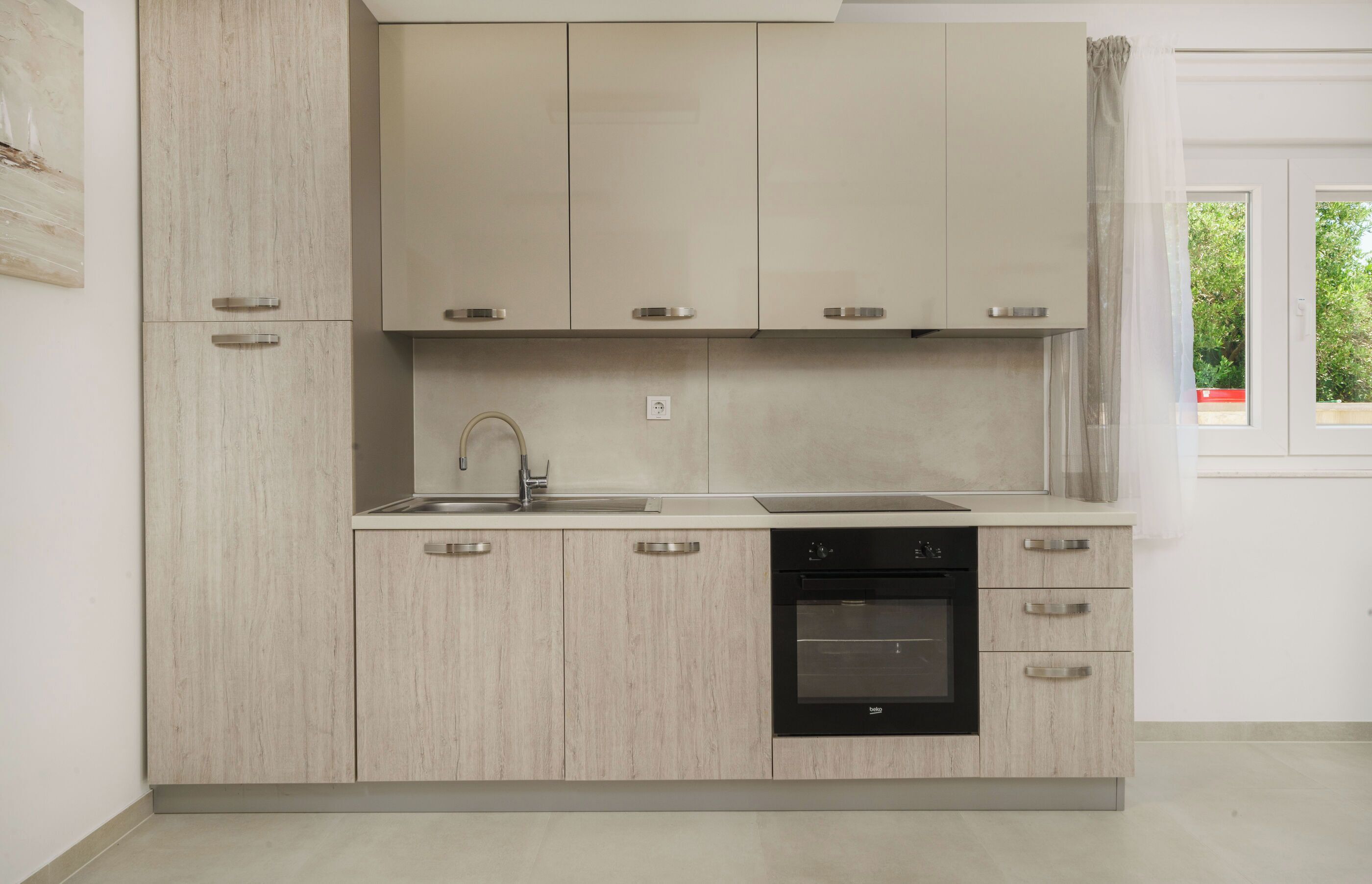 Departamento (A1) | Cocina privada | Refrigerador, microondas, horno y parrilla de estufa 