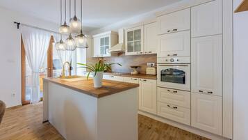 Villa | Private kitchen | Espresso maker, fridge, microwave, oven